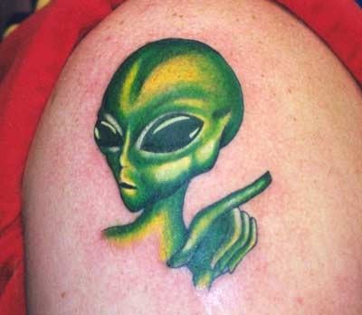Green alien tattoos