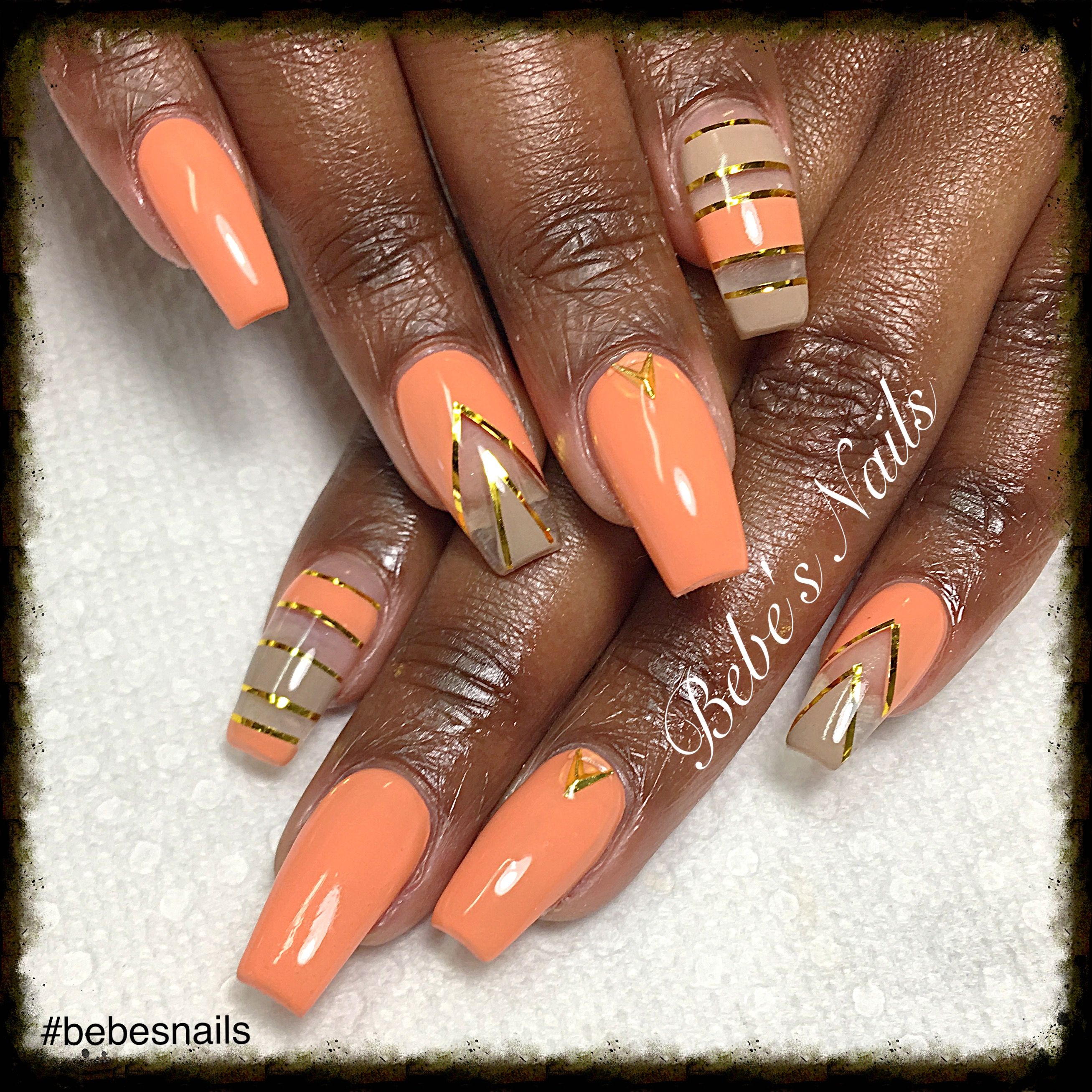 gray and orange nail design