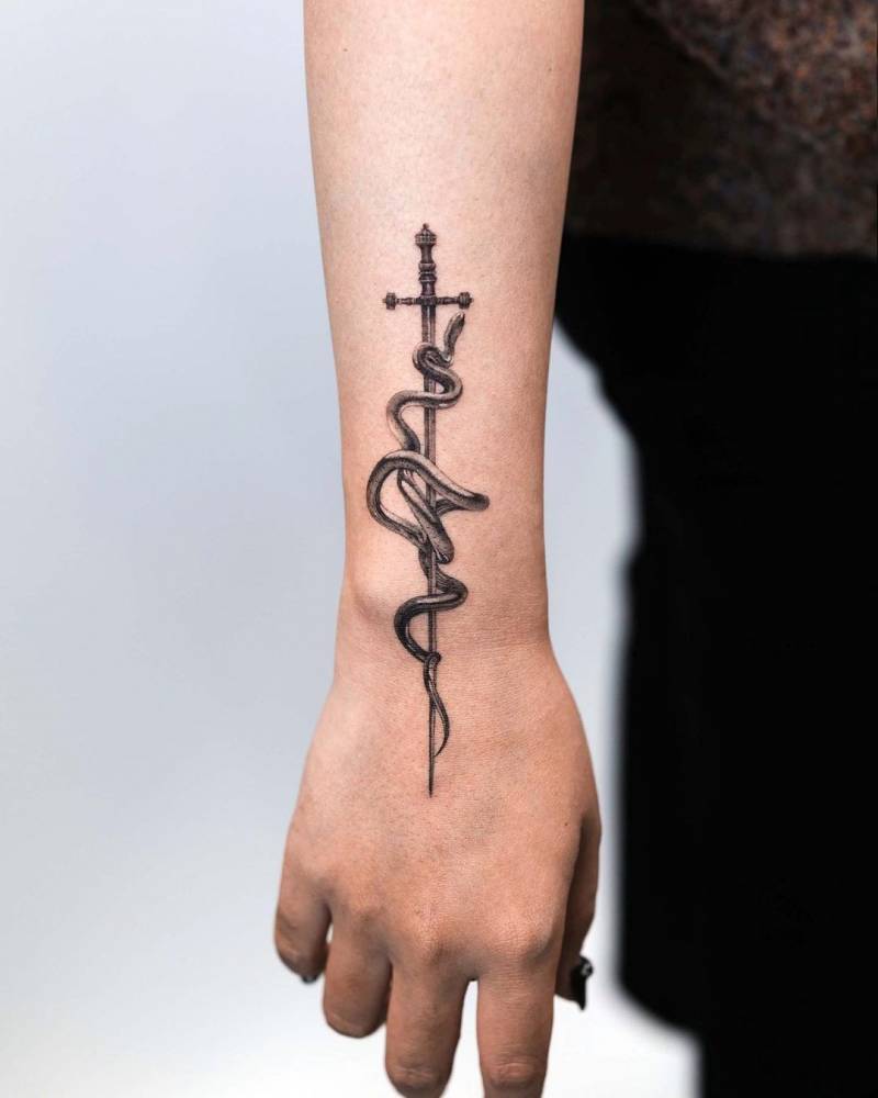 snake and dagger tattoos