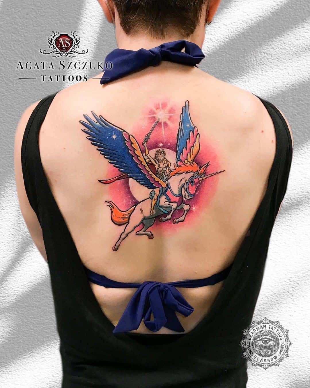 unicorn back tattoos for women