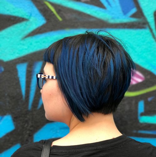 Blue highlights on short black hair